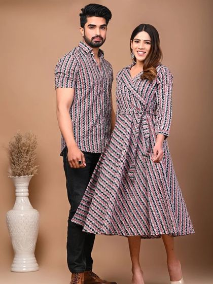 This couple's set features a stylish striped Jaipuri print. The woman's dress is designed with a flattering wrap-around style, while the man's shirt offers a classic fit, both made from soft pure cotton.