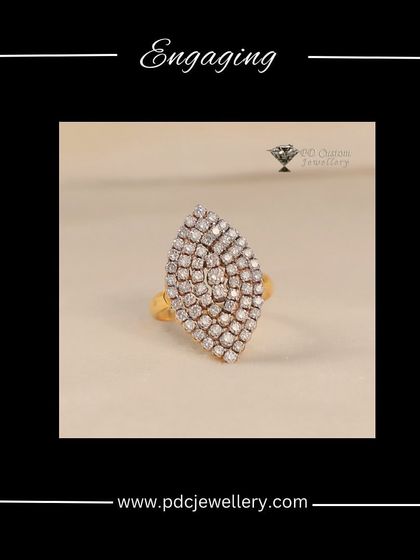 An engaging and elegant leaf-shaped ring. This 18kt gold piece is fully paved with diamonds, creating a large yet delicate cocktail ring that is sure to draw compliments.