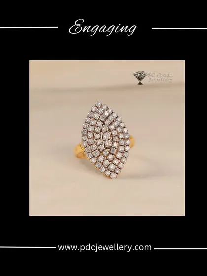 An engaging and stylish leaf-shaped diamond ring in 18kt gold. The elongated design is both elegant and eye-catching, perfect for someone who loves unique jewellery.