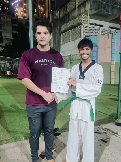 Another belt, another step forward. I'm proud to present this green belt certificate to a student who has shown great dedication and progress in his training.