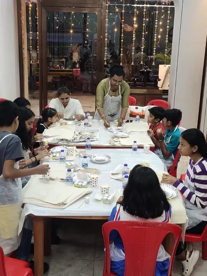 Here's a view of our kids' workshop in full swing. We make sure everyone has the materials and support they need to feel confident and have fun while they create.
