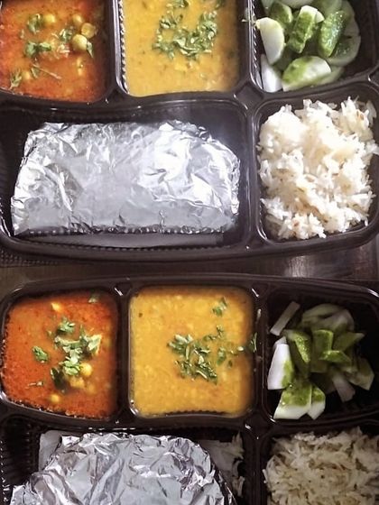 A standard daily thali with dal tadka and matar paneer. A simple, nutritious, and delicious meal for any day of the week.