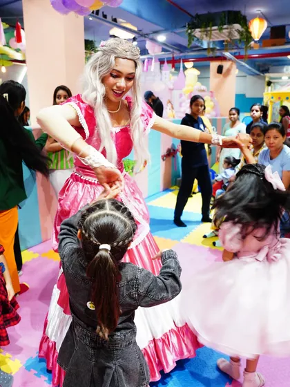 The princess leads the little ones in a dance. Our character performers are trained to create a fun and inclusive atmosphere for all the children.