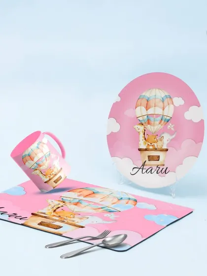 A dreamy hot air balloon themed dinner set for 'Aaru'. This adorable pink set includes a personalised plate, mug, and placemat, perfect for a special birthday gift.