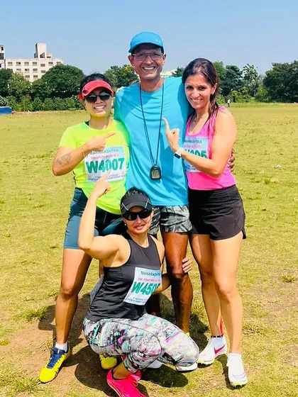 The team with our coach on the field during the Masters Championship. Expert guidance and team support are key ingredients to our success.