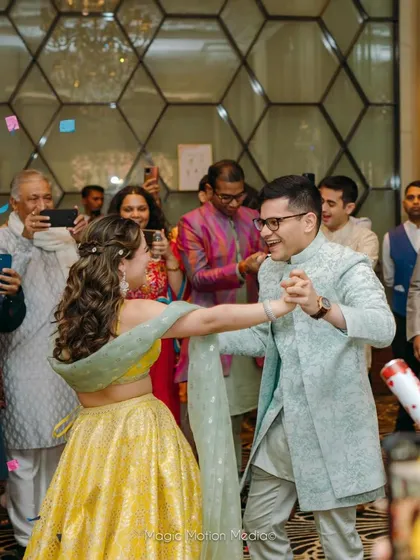 A candid dancing shot, showing how the hairstyle stays beautiful even while celebrating.