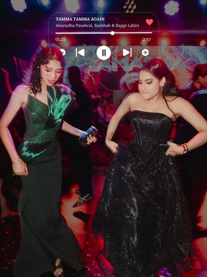 Every wedding has that one song that makes the dance floor come alive. This photo captures that exact moment of collective joy.