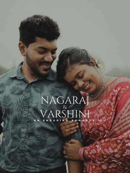 A pre-wedding portrait with a vintage feel, capturing a couple's tender moment in front of Bengaluru's Vidhana Soudha.