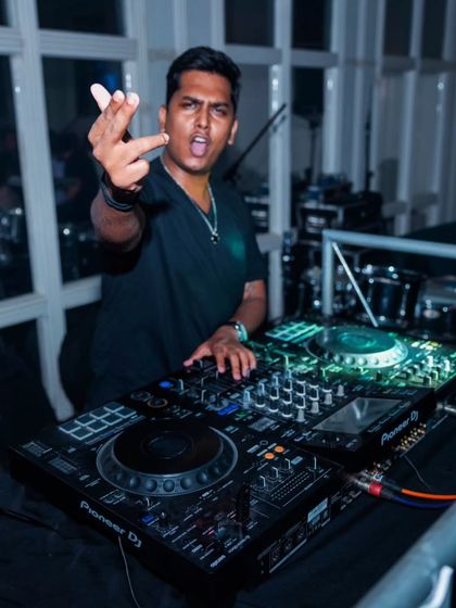 Getting the crowd hyped. I use my energy to lift the room, interacting directly with the audience to get them engaged.