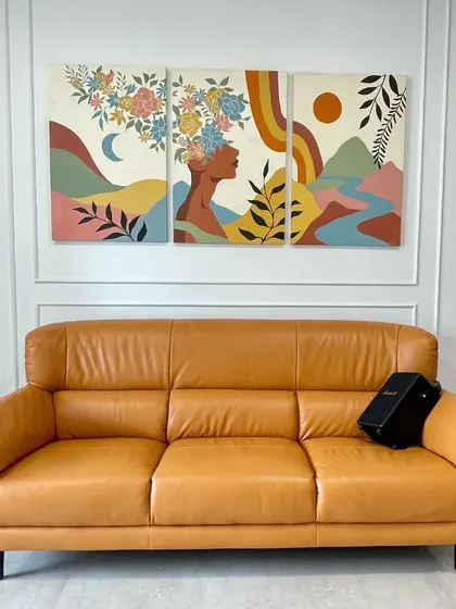 A BOHO style multi-panel canvas painting created to bring a sense of freedom and nature indoors. This original artwork combines earthy tones, floral elements, and modern design to create a beautiful focal point above a sofa.