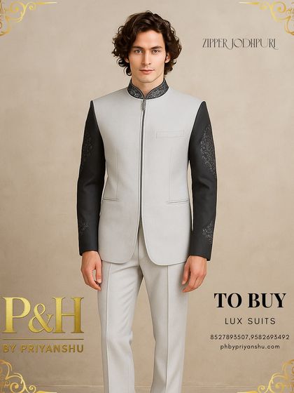 This portrait captures the sophisticated and contemporary feel of the light grey and black Jodhpuri suit.