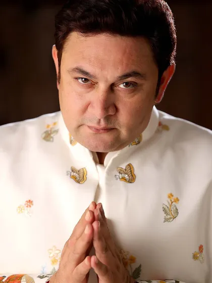 A traditional yet intense look for actor Rajesh Kumar. This shot combines classic ethnic wear with a strong expression, showing a different side to the comedic actor.