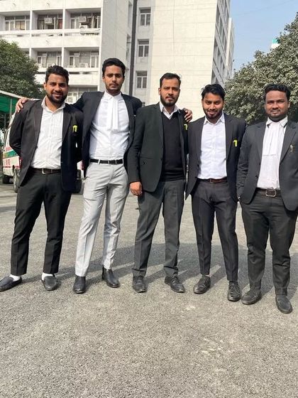 Posing with my team of fellow advocates. Together, we tackle complex legal challenges with shared dedication.