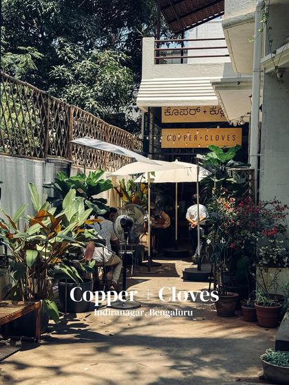 A snapshot of our bustling cafe entrance, a popular spot in Indiranagar for plant-based food and a great atmosphere.