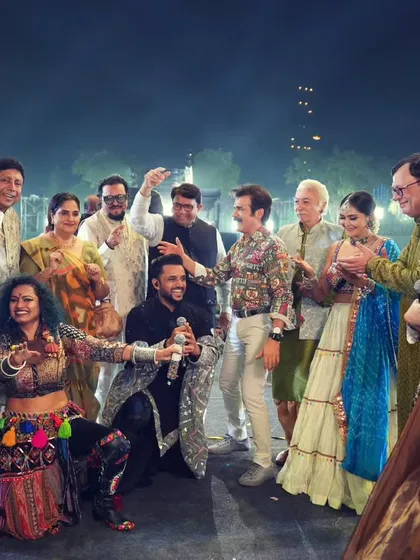 A fun group photo on stage with the entire Khichdi movie cast and the event team.