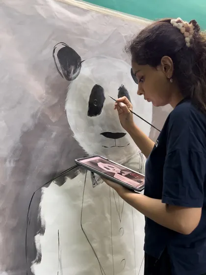 Here I am in my studio, bringing a client's fun idea to life. This is where your stories, memories, and inspirations get turned into tangible art. Seeing the joy on a client's face is why I love what I do.