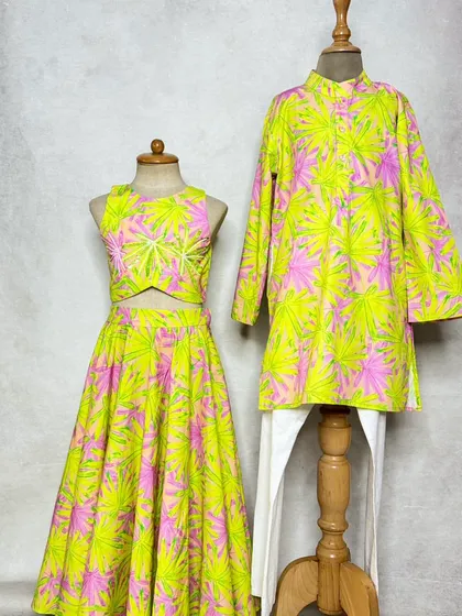 Who says festive wear can't be fun? Our Neon Leaves lehenga and kurta set brings a pop of vibrant color, perfect for siblings who love to stand out.