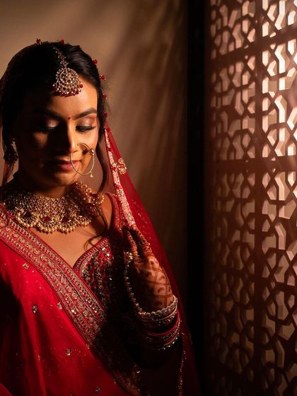 Portraits of my bride Sameera. I created a beautiful look that complemented her dusky skin tone and classic red lehenga.