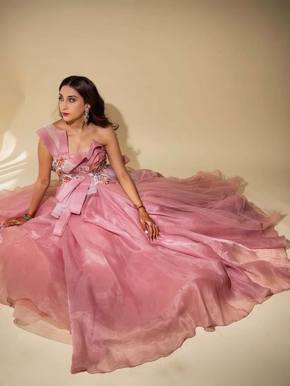 The full view of this fairytale after-party look. The makeup was designed to be elegant and photogenic, allowing the architectural beauty of the Abu Jani Sandeep Khosla gown to shine.