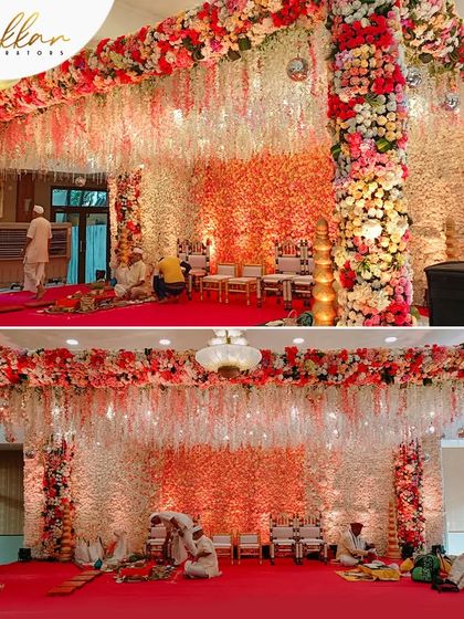 A stunning floral mandap with a backdrop of thousands of flowers. The before-and-after view shows the incredible transformation my team and I can achieve.
