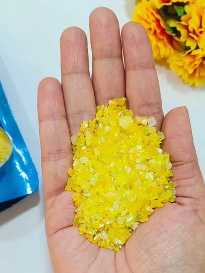 Our holographic glass granules are also available in a sunny yellow. These granules catch the light beautifully, adding a magical, sparkling effect to your resin creations.