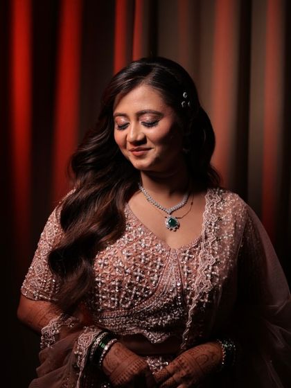 A beautiful portrait of Pranjali. The soft lighting highlights her radiant skin and the delicate shimmer on her eyes.