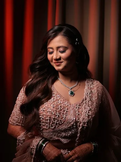 A beautiful portrait of Pranjali. The soft lighting highlights her radiant skin and the delicate shimmer on her eyes.