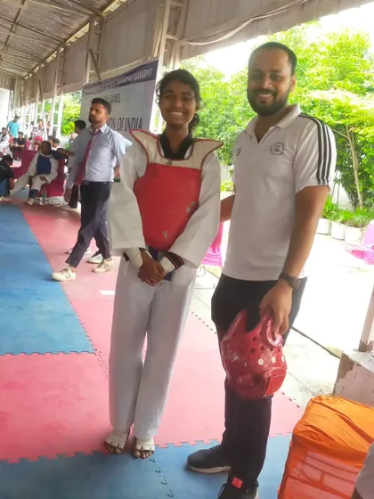 A moment before the match at the National Sikh Games. We prepare our students to be calm and focused.
