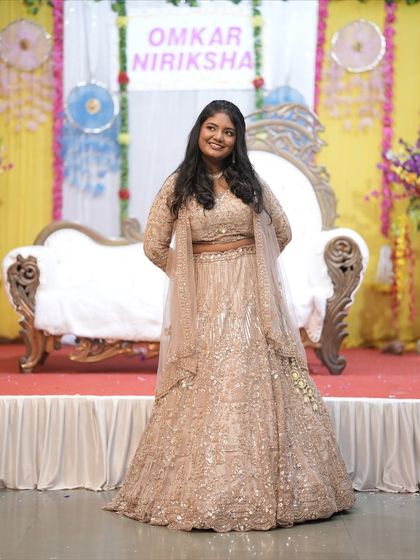 Another look at the happy bride in my rental lehenga. The full-sleeve blouse provides a bit more coverage while still looking incredibly elegant and modern.