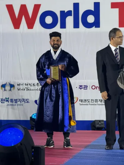 A personal honor to receive an appreciation plaque while dressed in traditional Korean attire during the World Taekwondo Culture Expo.