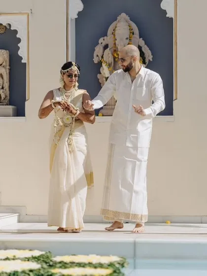 The couple dancing in front of a Ganesha idol, blending tradition with celebration. We ensure that cultural and religious elements are respectfully and beautifully integrated into every event.