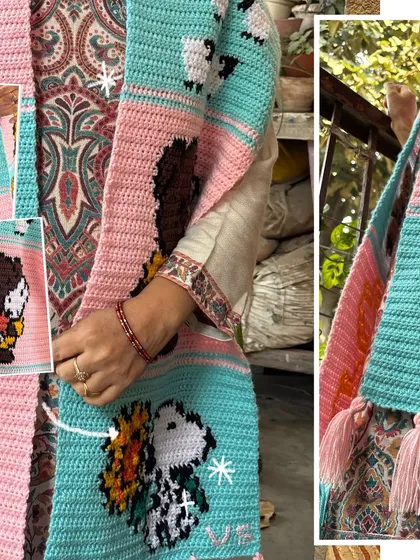 A side view of the custom tapestry muffler, showing how the different character panels are joined together.