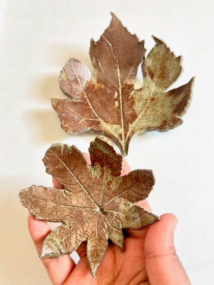 More examples of my leaf-imprinted wall art. The rustic, earthy glazes make them feel like fossilized treasures.