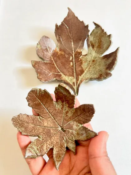 More examples of nature-inspired wall art, these ones shaped like maple and papaya leaves.