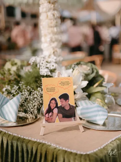 More examples of our personalized table placards, featuring the couple's pets and funny memes that tell their unique love story.