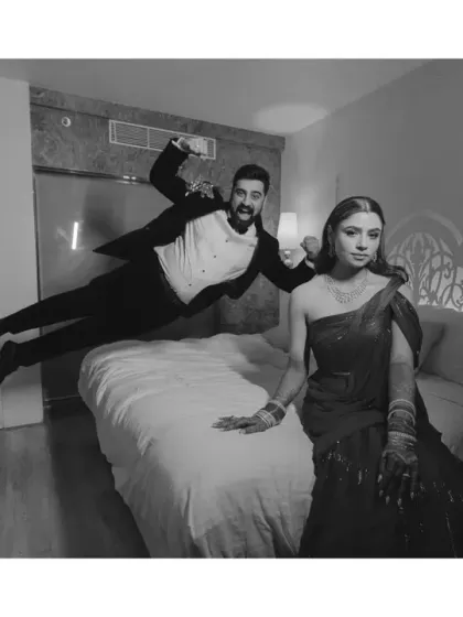 Why settle for the usual when fun tells a better story? This playful, energetic portrait with the groom mid-air becomes even more dramatic and timeless in black and white.