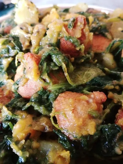 Palong Shakeyr Ghonto is a simple, rustic spinach dish made with seasonal vegetables and fried lentil dumplings ('bori') for texture. It's the perfect first course with hot rice.