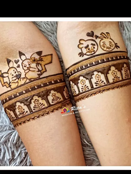 Your mehendi can be fun too! This bride wanted to include her favorite things, so I created custom Pikachu and Angry Birds armbands. If you have a quirky idea, whether it's a cartoon or your favorite food, I can weave it into your design.