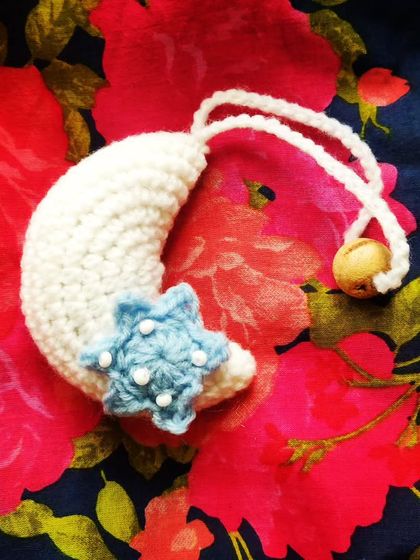 Mubarak Eid Ul Adha. A beautiful crochet moon and star ornament to celebrate the festival. May it bring happiness and prosperity to all.