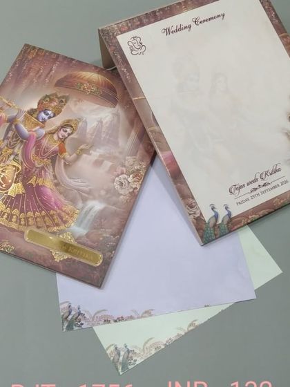 This invitation features a beautiful and vibrant illustration of Radha and Krishna. The rich colors and gold foil accents make it a stunning choice for a religious wedding.