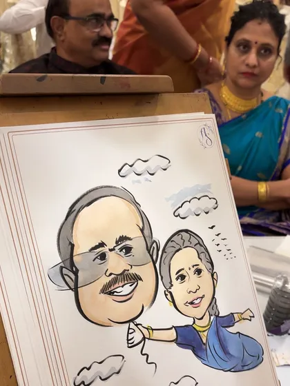 A whimsical take on a couple's portrait, where the wife holds her husband's caricature like a balloon. This shows the creative and fun possibilities for your custom art.