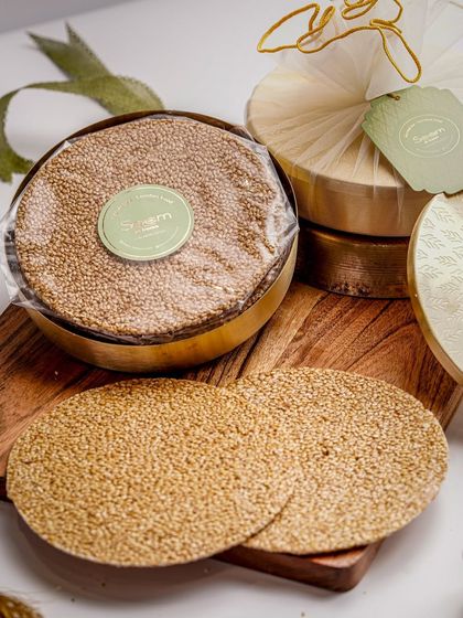 This Makar Sankranti, celebrate with my healthy and traditional til chikki. Made with sesame seeds and natural jaggery, it's a guilt-free treat packed in a beautiful brass container for gifting.