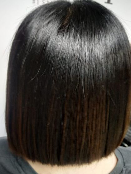 Another example of our precision bob haircut, demonstrating its structure and shape from the back.