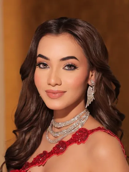 A duplicate of 65, this portrait emphasizes the stunning diamond necklace and earrings.