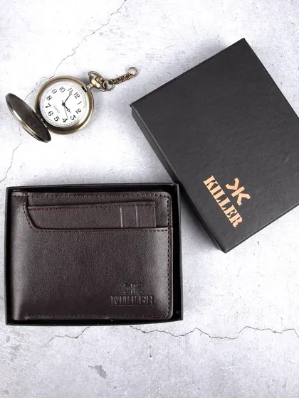 The dark brown leather wallet displayed in its branded gift box.