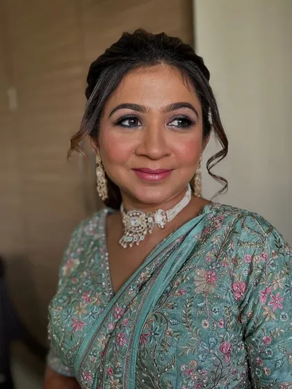 A candid, smiling shot. The client looks happy and confident.