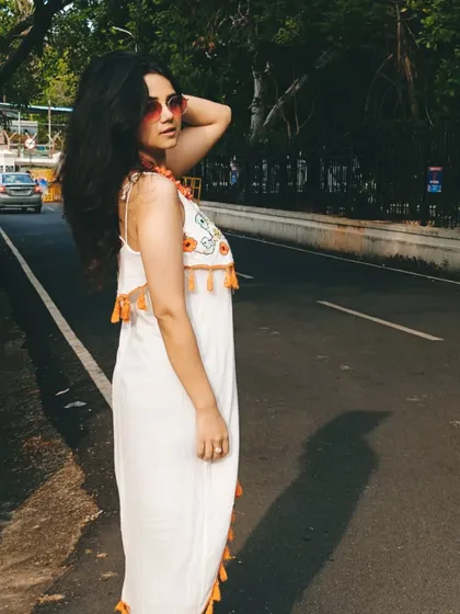 The same tassel dress, pictured on the streets of Pondicherry. It's light, airy, and has just enough detail to make it interesting, making it an ideal vacation dress.