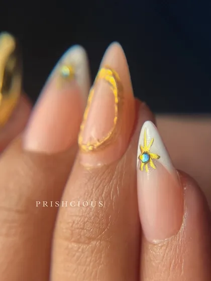 Another look at some chrome details, this time with a celestial theme. I created a gold crescent moon and star on a modern French tip base.