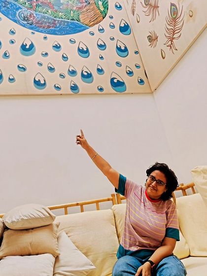 Here I am in the finished space, sitting within the installation. This gives a sense of the scale of the paintings and the feeling of being completely surrounded by the art.