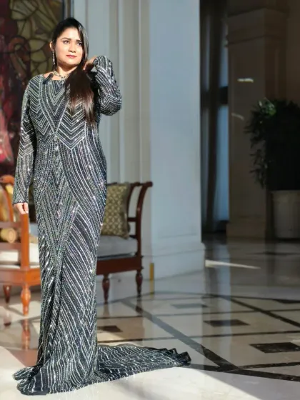 For high-end corporate galas and summits, presence is everything. This look from the SolutionX Summit at The Leela Palace reflects the elegance and sophistication I bring to premium events, ensuring the host's style matches the event's prestige.